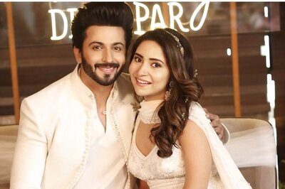 Dheeraj Dhoopar and Vinny Arora Twin in White at Their Baby Shower