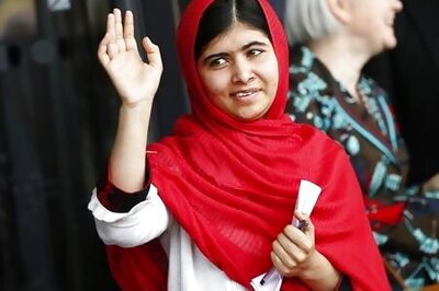 Malala meets Queen Elizabeth, regrets missing school