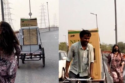 Watch: Woman Helps Rickshaw Puller Carrying Heavy Goods On Flyover, Internet Reacts