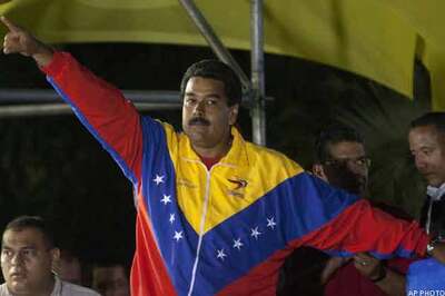 Chavez's heir Maduro to take over divided Venezuela