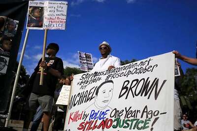 Two shot in Ferguson amid standoff between police, protesters