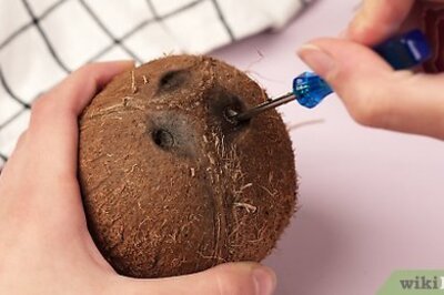 How to Open a Coconut with a Hammer, Oven, or Microwave