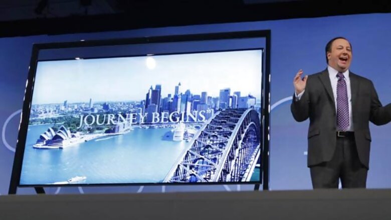 Samsung, LG unveil super-thin, curved televisions