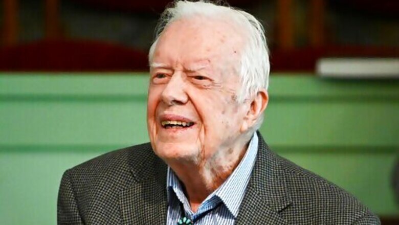 Vaccinated For Virus, Jimmy Carter And Wife Back In Church