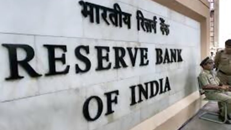 Rupee closes flat; RBI rate decision key