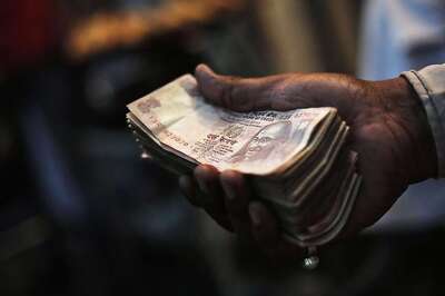 Rupee Up 10 Paise Against Dollar