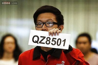 AirAsia mourns with grey logo after plane goes missing