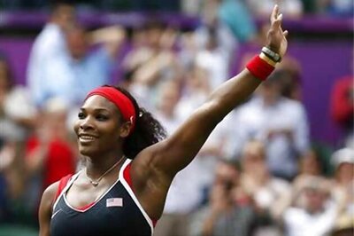 Venus, Serena advance at London Olympics