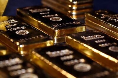 Gold's record breaking rally halts as dollar strengthens