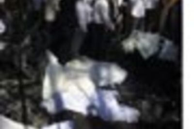 Oct 30 in pics: Blasts, job cuts and a political potboiler