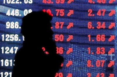 Global Markets: Shares Fall, Dollar Rises As Markets Wait For Dovish Fed Hints