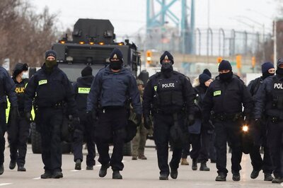 Latest International News Updates: Canadian Police Reopen Ambassador Bridge, Russian Troops Strengthen Positions Near Ukraine's Borders And More