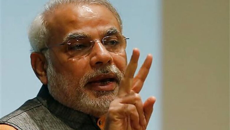 Congress afraid of a tea seller's challenge, says Narendra Modi