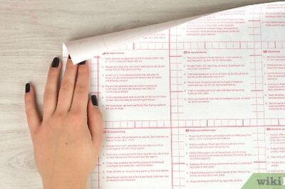 How to Cover a Paperback Book With Clear Plastic Film