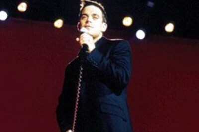 Robbie wears a corset to keep in shape