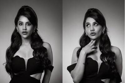 Actress Nabha Natesh Oozes Oomph In Short Off-shoulder Black Dress