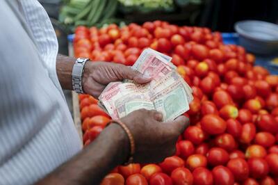 Rupee Regains 10 Paise to 67.10 vs US Dollar