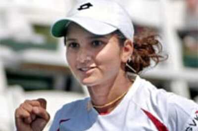 Sania-Santoro cruise into second round