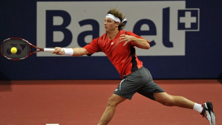 Nalbandian, Djokovic reach Swiss Indoors QF