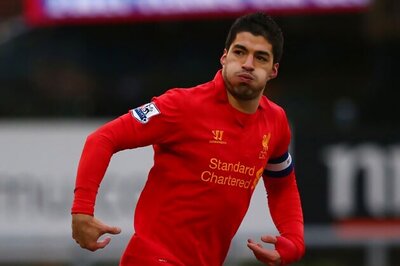 Suarez staying at Liverpool even without Champions League