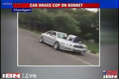 Speeding car driver caught speaking on mobile, hits traffic constable, drags him for one kilometer