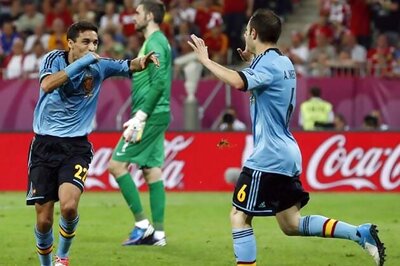 Navas late strike takes Spain into quarters