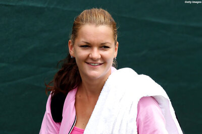 Radwanska, Stosur, Li enter second round