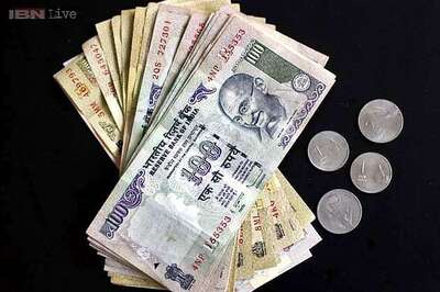 Rupee gains 34 paise to end at 8-month high against dollar