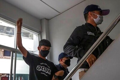 Thai protesters threaten escalation as police make arrests