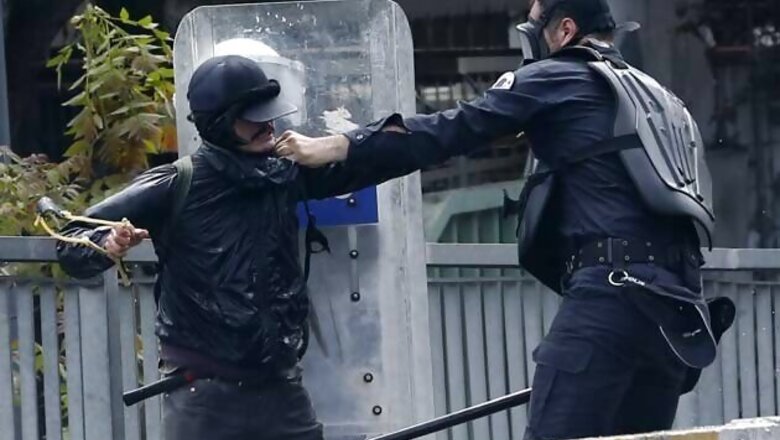 Riot police clash with May Day protesters in Istanbul