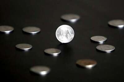 Rupee up 13 paise against dollar in early trade