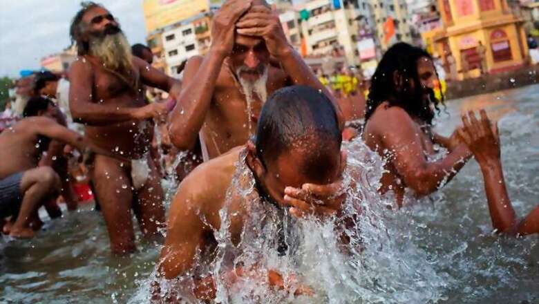 Tens of thousands take holy dip at India's Kumbh Mela