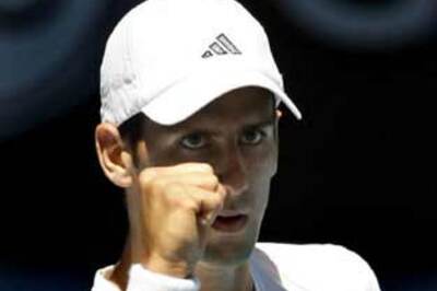 Djokovic dumped while Federer flies into semis