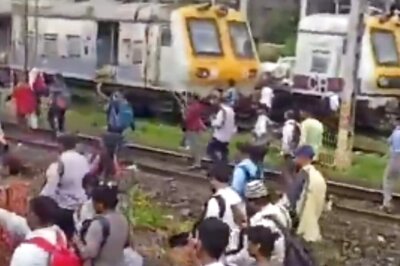 Mumbai Commuters Take To Walking On Tracks To Reach Office After Local Train Service Fails | WATCH