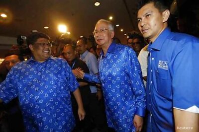Malaysia coalition extends rule in tight election