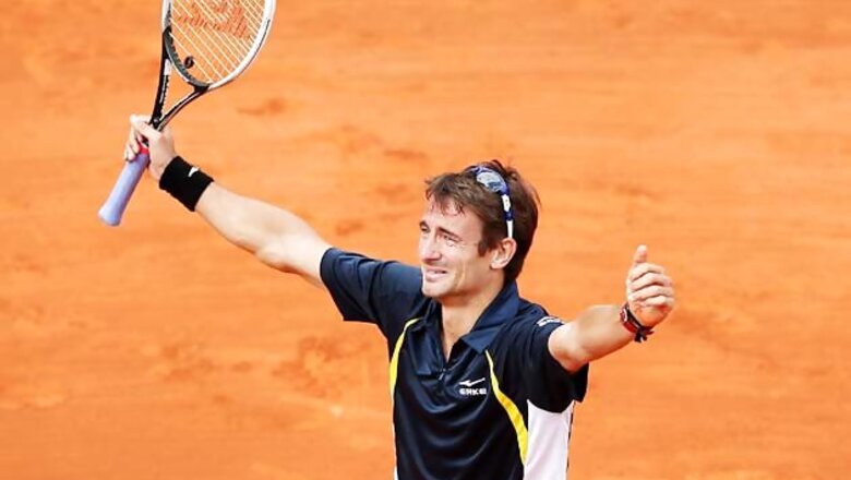 Tommy Robredo comes from two sets down to reach last eight