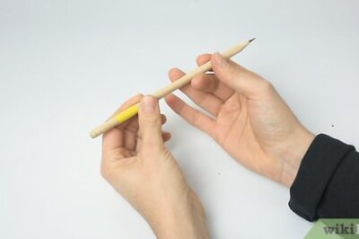 How to Spin a Pencil Around Your Middle Finger