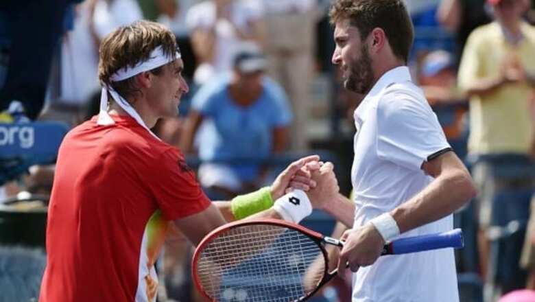 Gilles Simon upsets 4th-seeded David Ferrer at US Open