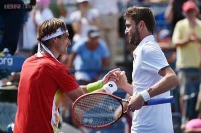 Gilles Simon upsets 4th-seeded David Ferrer at US Open